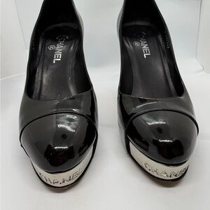 CHANEL Black Platform Pumps with Silver Accent Toe